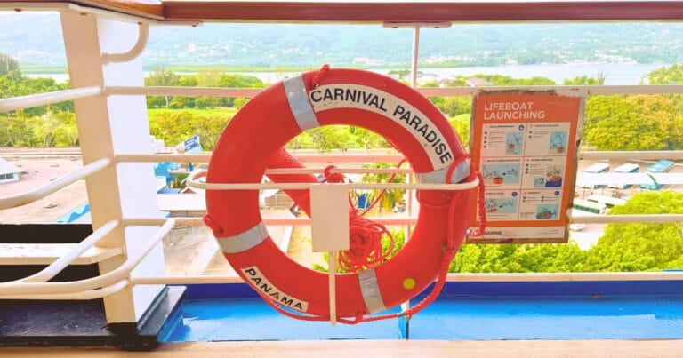 Orange Carnival Paradise life ring on the ship’s railing; Carnival returns to Jamaica on November 10.